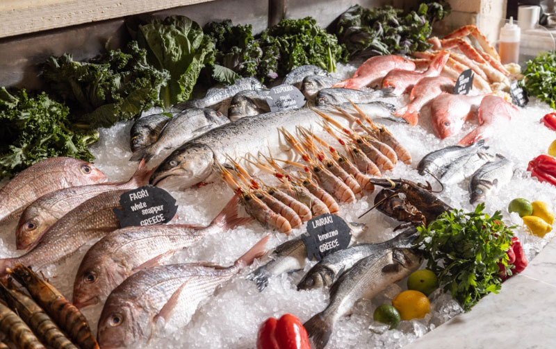 fresh whole fish on ice