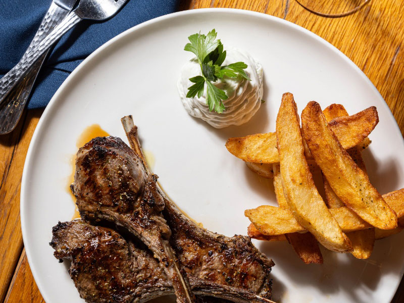 Lamb chops with Greek fried potatoes and tzatziki