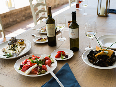 tables served with appetizers and wine